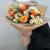 Букет "Апельсин" из роз и хризантем сантини в Зарайске
